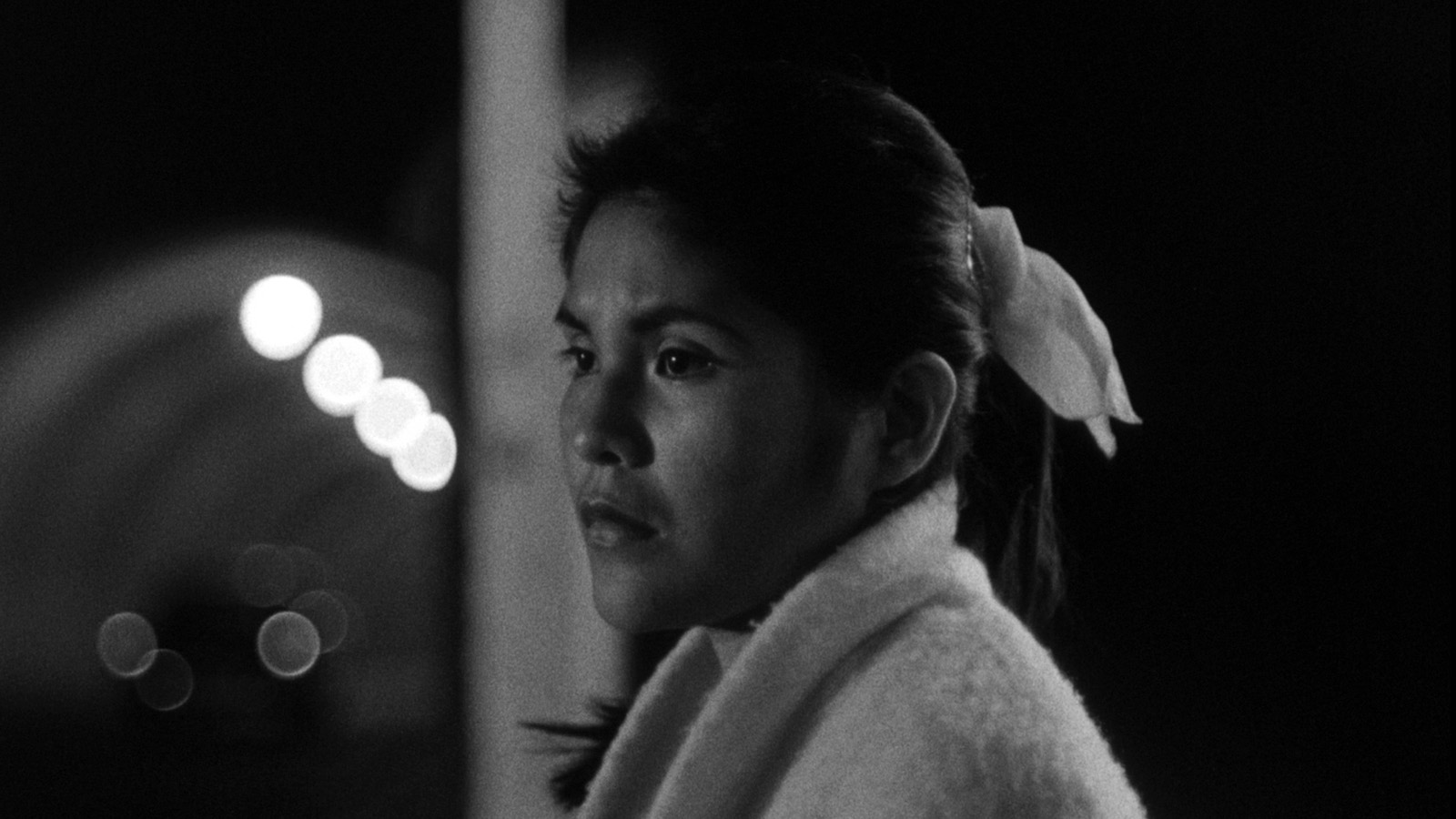 Yvonne Williams in front of the Third Street Tunnel in L.A. in Kent Mackenzie's THE EXILES (1961). Charles Burnett and Sherman Alexie present a Milestone Films release. The film was restored from the original 35mm materials by Ross Lipman and the UCLA Film &amp; Television Archive.
